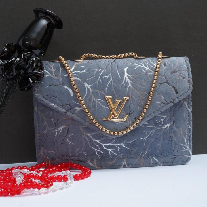 Woman's velvet Textured purse with chain