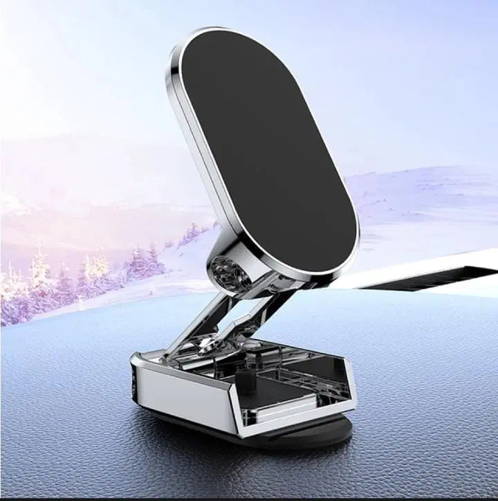Car phone holder on a car dashboard with a blurred outdoor background